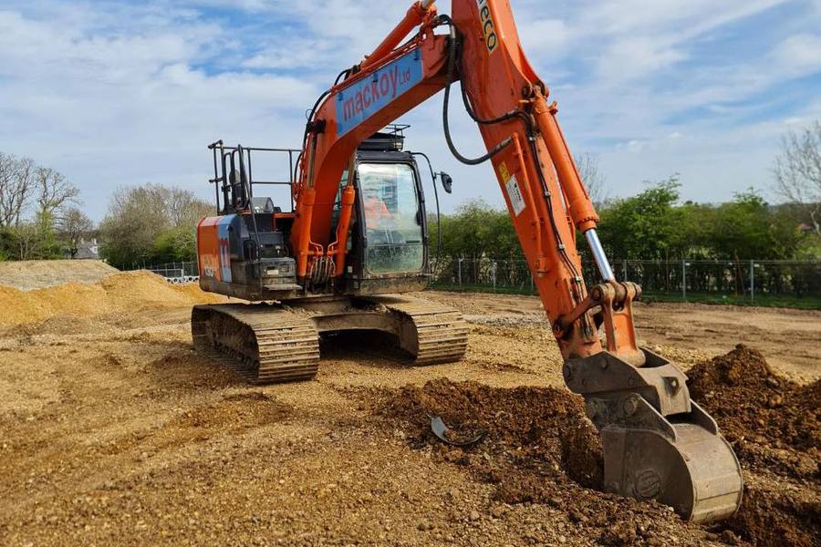 Excavator operator training on a construction site near Southampton